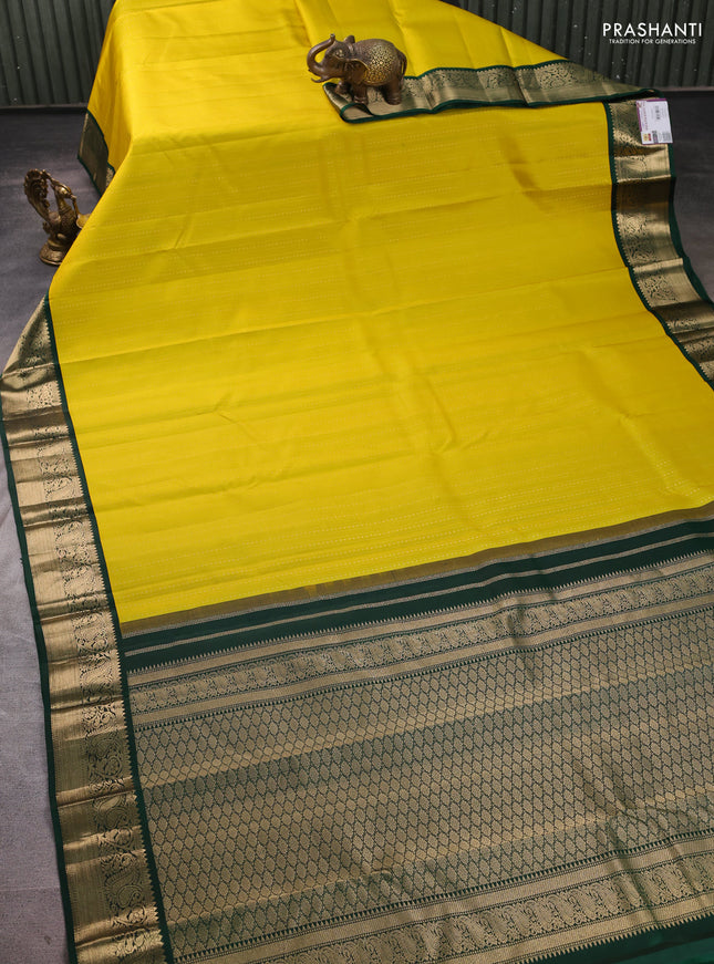 Pure kanchipuram silk saree lime green and green with allover zari stripes & zari woven 1000buttas and zari woven korvai border