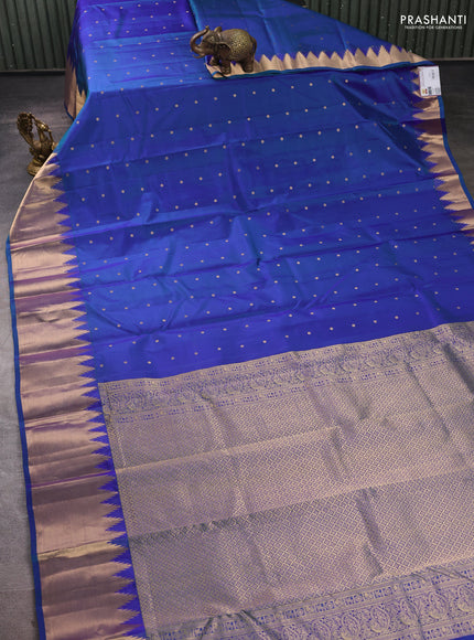 Pure kanchipuram silk saree dual shade of bluish green with allover zari woven 1000 buttas and temple zari woven border
