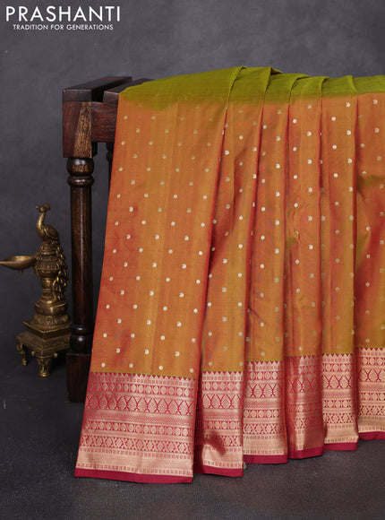 Pure kanchipuram silk saree dual shade of greenish maroon and maroon with allover zari woven 1000 buttas and zari woven korvai border