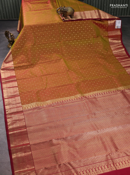 Pure kanchipuram silk saree dual shade of greenish maroon and maroon with allover zari woven 1000 buttas and zari woven korvai border