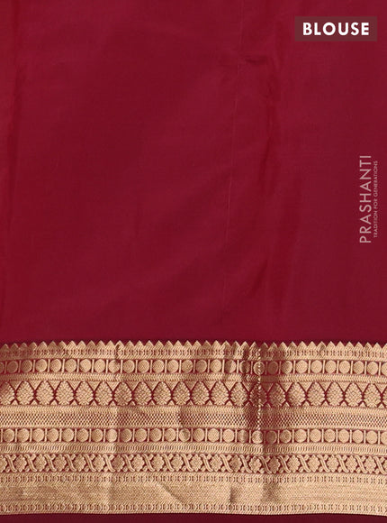 Pure kanchipuram silk saree dual shade of greenish maroon and maroon with allover zari woven 1000 buttas and zari woven korvai border