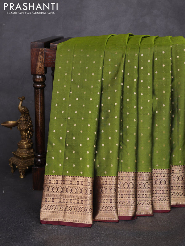 Pure kanchipuram silk saree mehendi green and deep maroon with allover zari woven 1000 buttas and zari woven korvai border