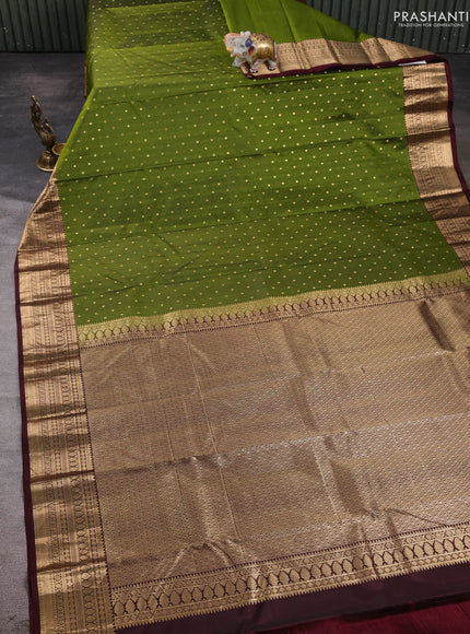Pure kanchipuram silk saree mehendi green and deep maroon with allover zari woven 1000 buttas and zari woven korvai border