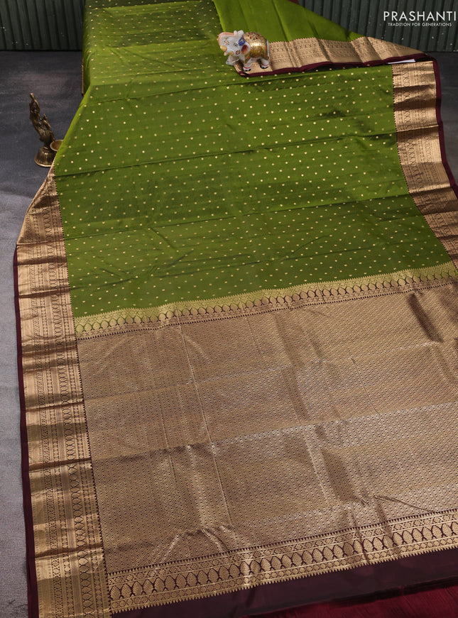 Pure kanchipuram silk saree mehendi green and deep maroon with allover zari woven 1000 buttas and zari woven korvai border
