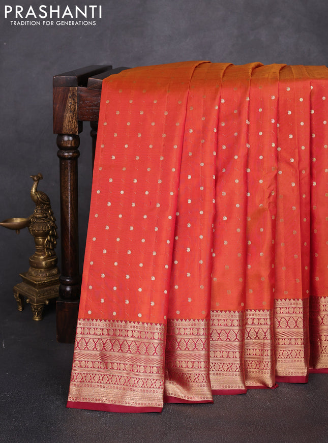 Pure kanchipuram silk saree rust shade and maroon with allover zari woven 1000 buttas and zari woven korvai border