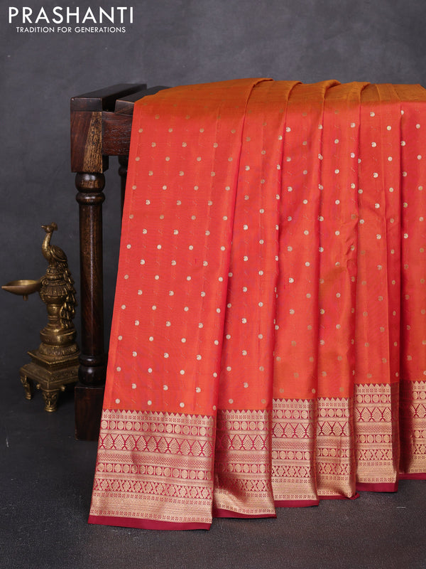 Pure kanchipuram silk saree rust shade and maroon with allover zari woven 1000 buttas and zari woven korvai border