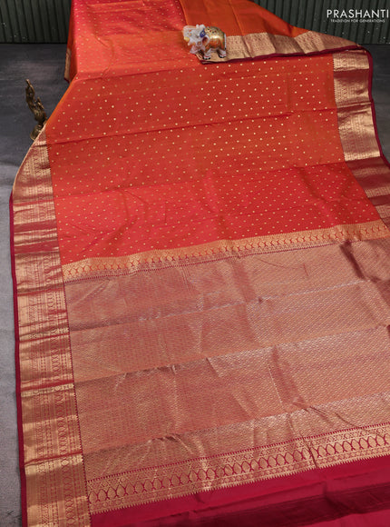 Pure kanchipuram silk saree rust shade and maroon with allover zari woven 1000 buttas and zari woven korvai border