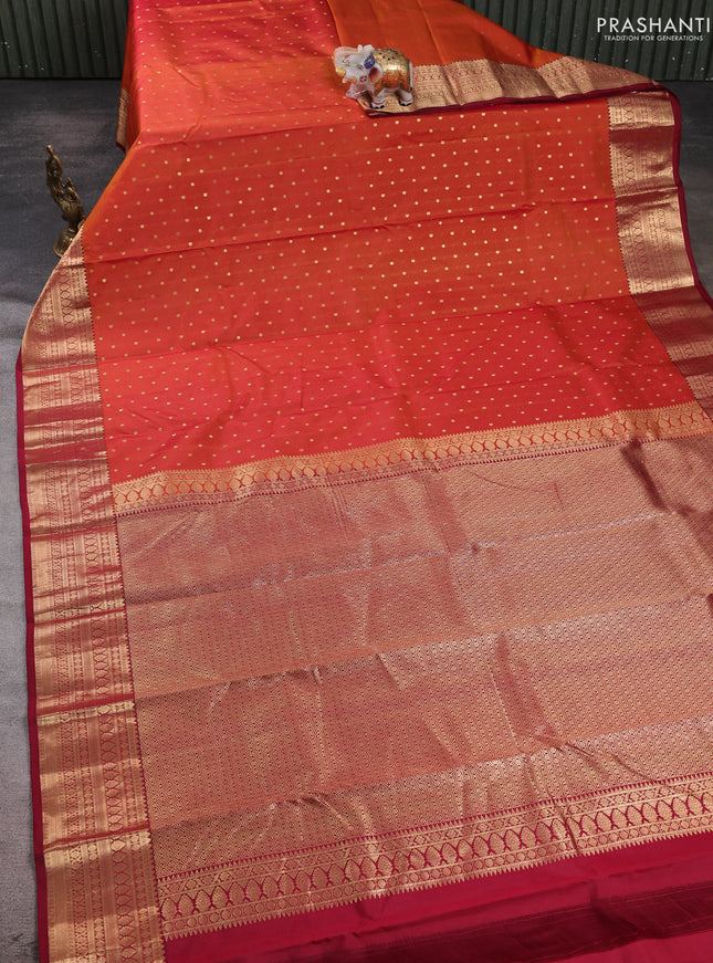 Pure kanchipuram silk saree rust shade and maroon with allover zari woven 1000 buttas and zari woven korvai border