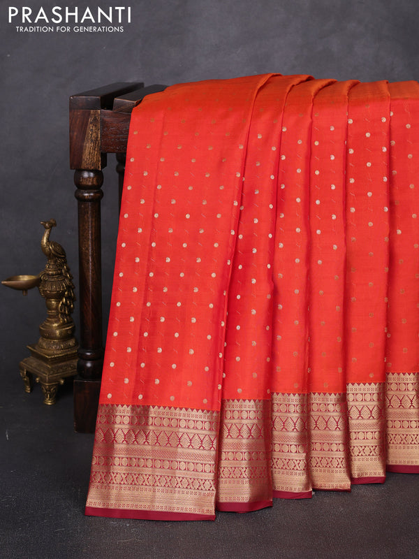 Pure kanchipuram silk saree orange and deep maroon with allover zari woven 1000 buttas and zari woven korvai border