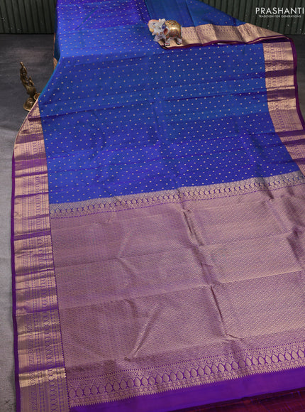 Pure kanchipuram silk saree dual shade of purple and purple with allover zari woven 1000 buttas and zari woven korvai border