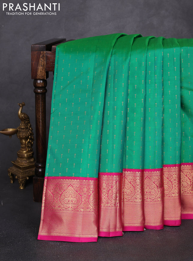 Pure kanchipuram silk saree dual shade of green and pink with allover zari woven 1000 buttas and zari woven korvai border