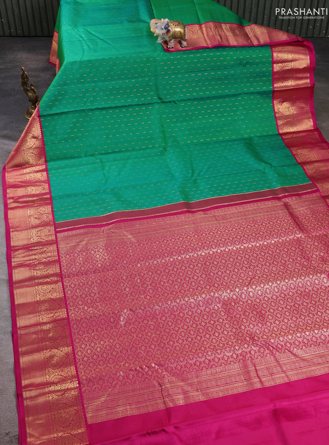 Pure kanchipuram silk saree dual shade of green and pink with allover zari woven 1000 buttas and zari woven korvai border