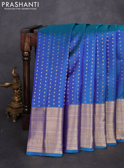 Pure kanchipuram silk saree dual shade of bluish green and maroon with allover zari woven 1000 buttas and long zari woven border