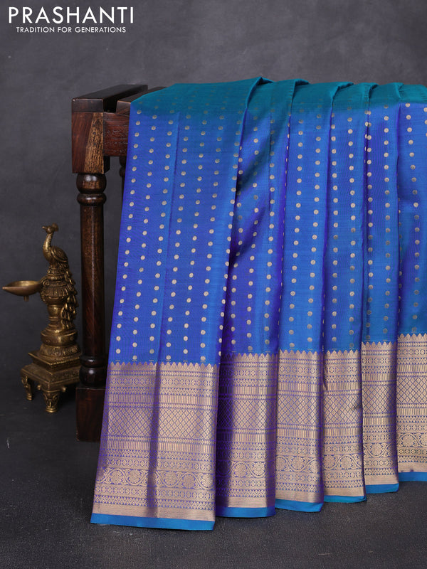 Pure kanchipuram silk saree dual shade of bluish green and maroon with allover zari woven 1000 buttas and long zari woven border