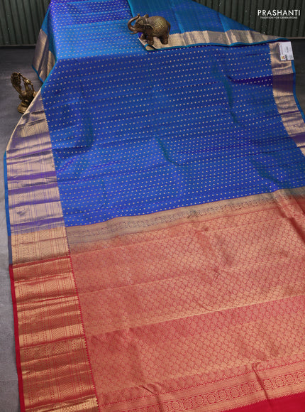 Pure kanchipuram silk saree dual shade of bluish green and maroon with allover zari woven 1000 buttas and long zari woven border