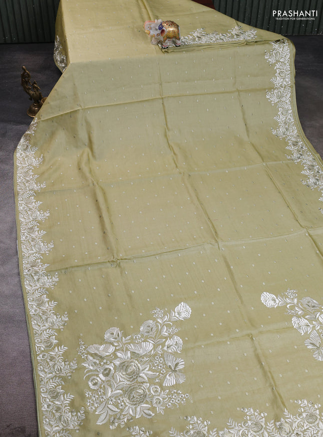 Pure tussar silk saree pista green with allover embroidery buttas and parsi embroidery border