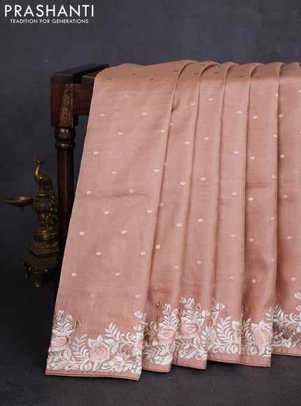 Pure tussar silk saree pastel peach shade with allover embroidery buttas and parsi embroidery border