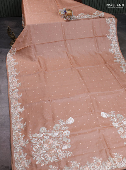 Pure tussar silk saree pastel peach shade with allover embroidery buttas and parsi embroidery border