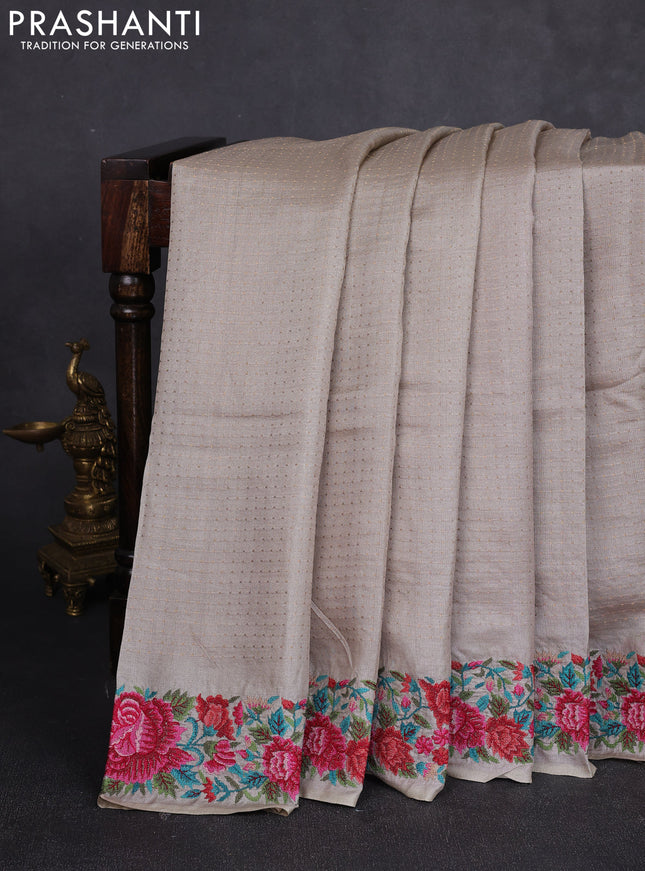 Pure tussar silk saree pastel grey with allover zari woven buttas and floral embroidery border