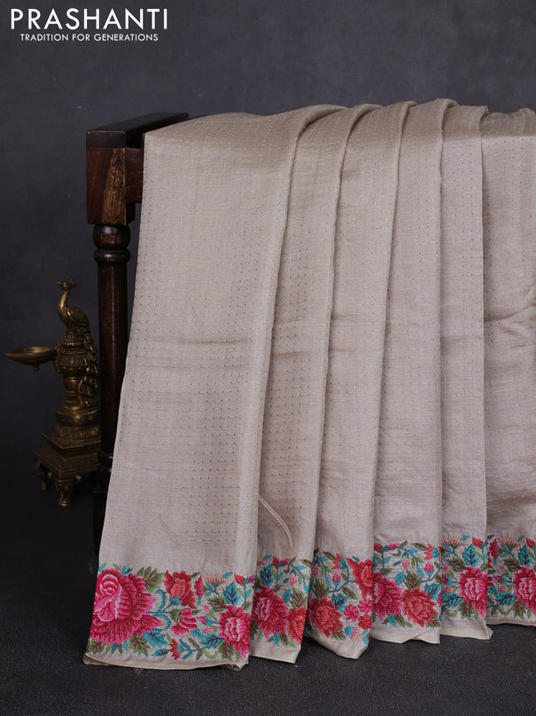 Pure tussar silk saree pastel grey with allover zari woven buttas and floral embroidery border