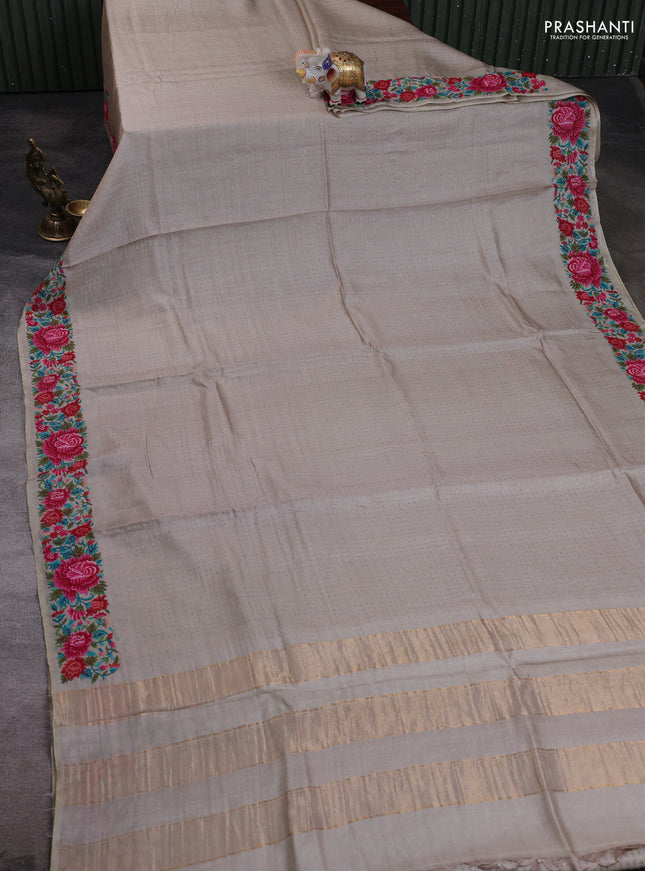 Pure tussar silk saree pastel grey with allover zari woven buttas and floral embroidery border