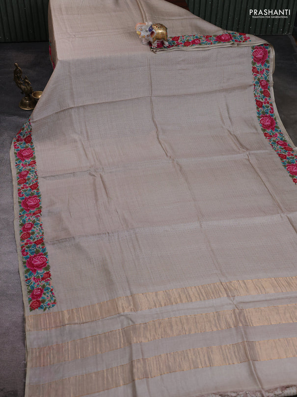 Pure tussar silk saree pastel grey with allover zari woven buttas and floral embroidery border