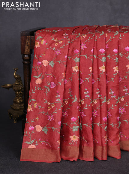 Pure tussar silk saree rust shade with allover floral embroidery work and zari woven border