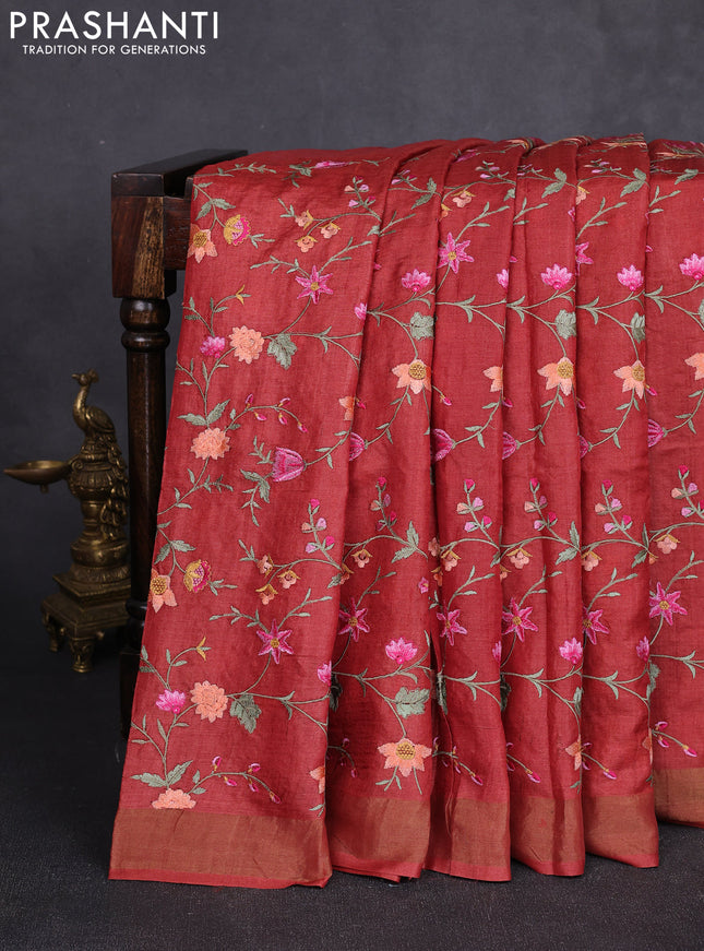 Pure tussar silk saree rust shade with allover floral embroidery work and zari woven border