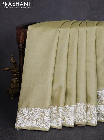Pure tussar silk saree pista green with plain body and parsi embroidery pallu & border