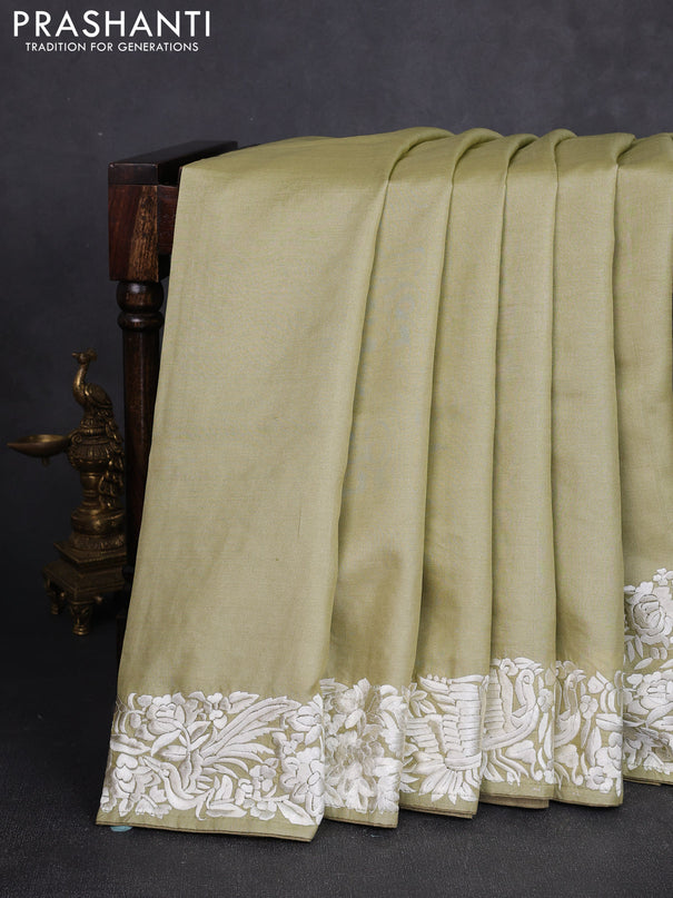 Pure tussar silk saree pista green with plain body and parsi embroidery pallu & border