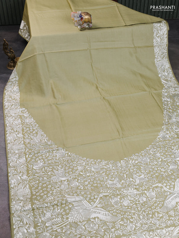 Pure tussar silk saree pista green with plain body and parsi embroidery pallu & border