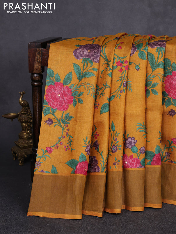 Pure tussar silk saree mustard yellow with allover floral prints & mirror work and cut work pallu