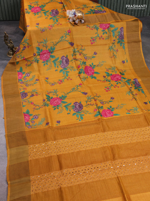 Pure tussar silk saree mustard yellow with allover floral prints & mirror work and cut work pallu