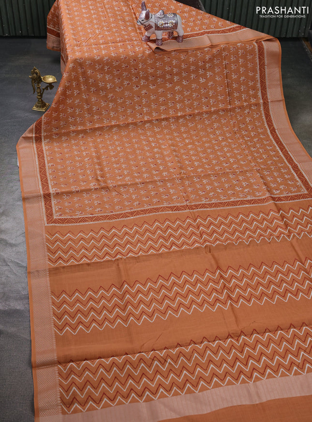 Maheshwari silk cotton saree dark peach with allover butta block prints and thread woven border