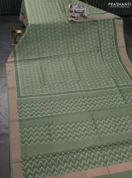 Maheshwari silk cotton saree pastel green with allover butta block prints and thread woven border