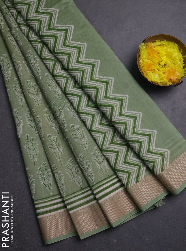 Maheshwari silk cotton saree pastel green with allover butta block prints and thread woven border