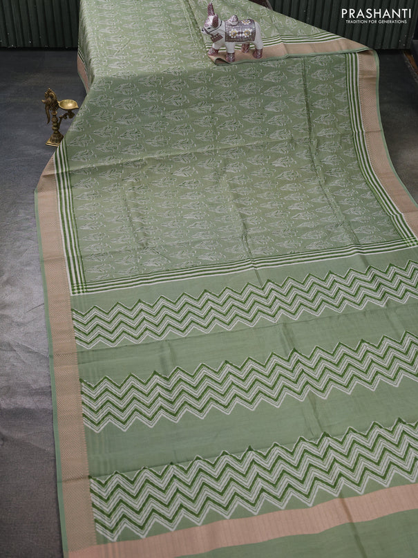 Maheshwari silk cotton saree pastel green with allover butta block prints and thread woven border