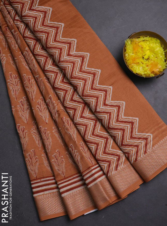 Maheshwari silk cotton saree rust shade with allover butta block prints and thread woven border