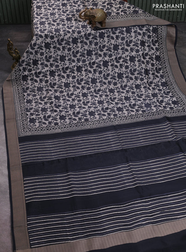 Maheshwari silk cotton saree beige and black with allover kalamkari block prints and thread woven border