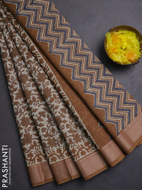 Maheshwari silk cotton saree cream and dark mustard with allover kalamkari block prints and thread woven border