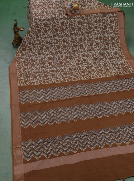 Maheshwari silk cotton saree cream and dark mustard with allover kalamkari block prints and thread woven border