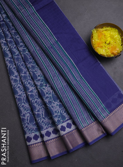Maheshwari silk cotton saree off white and blue with allover block prints and thread woven border