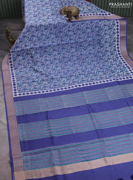 Maheshwari silk cotton saree off white and blue with allover block prints and thread woven border
