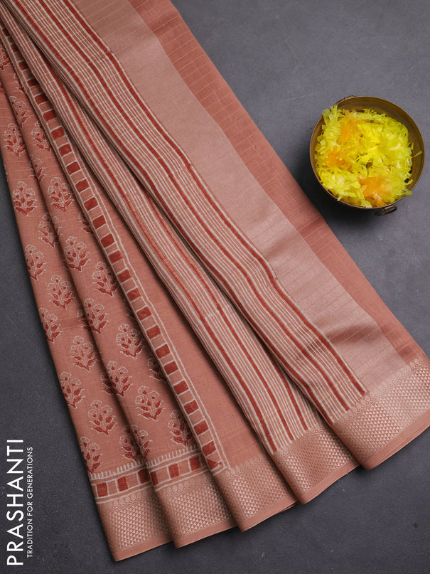 Maheshwari silk cotton saree pastel peach with allover floral butta block prints and thread woven border