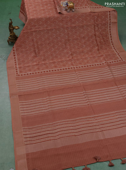 Maheshwari silk cotton saree pastel peach with allover floral butta block prints and thread woven border