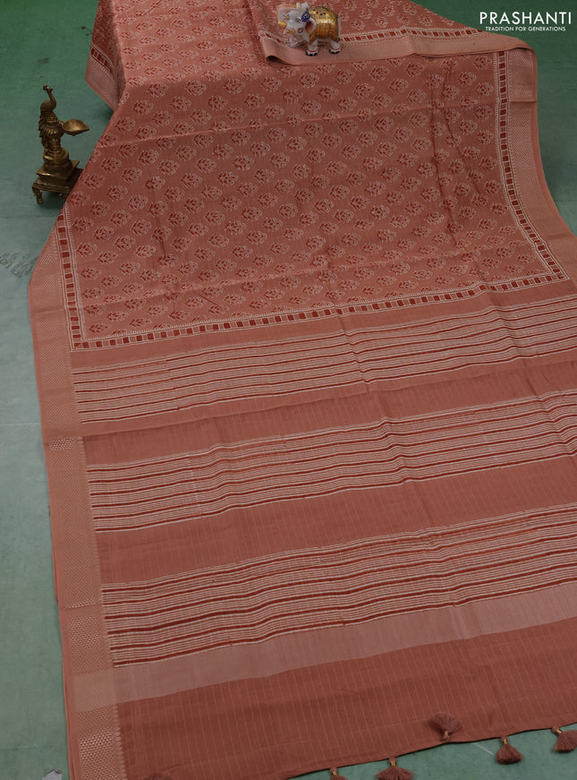 Maheshwari silk cotton saree pastel peach with allover floral butta block prints and thread woven border
