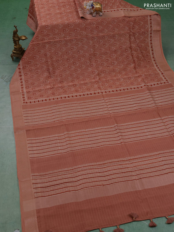 Maheshwari silk cotton saree pastel peach with allover floral butta block prints and thread woven border