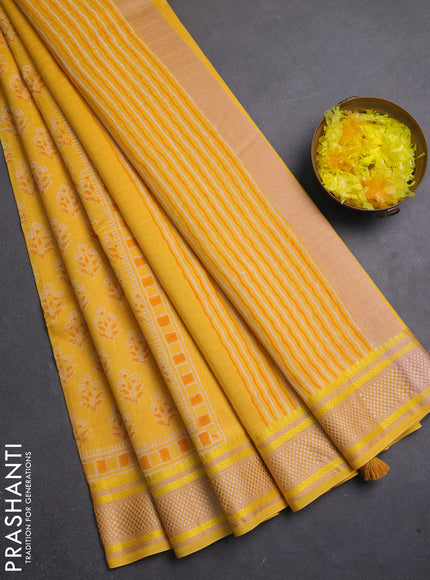 Maheshwari silk cotton saree yellow with allover floral butta block prints and thread woven border