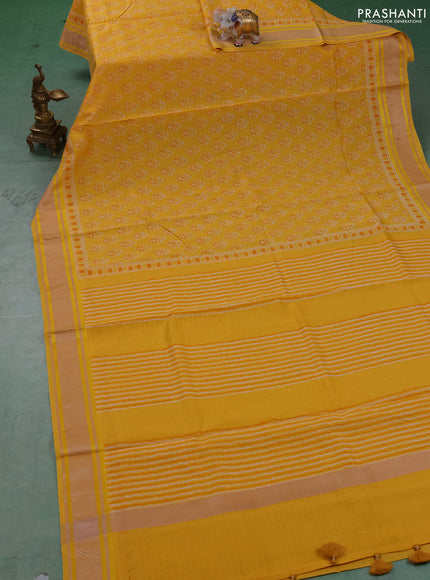 Maheshwari silk cotton saree yellow with allover floral butta block prints and thread woven border