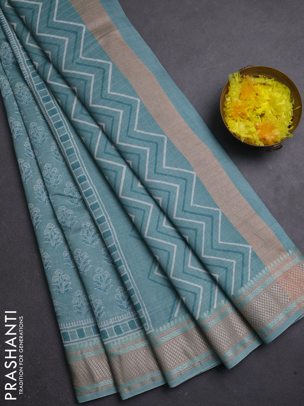 Maheshwari silk cotton saree pastel blue with allover floral butta block prints and thread woven border